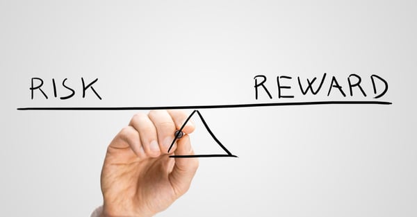 Diagram of a seesaw showing risk and reward in perfect equilibrium